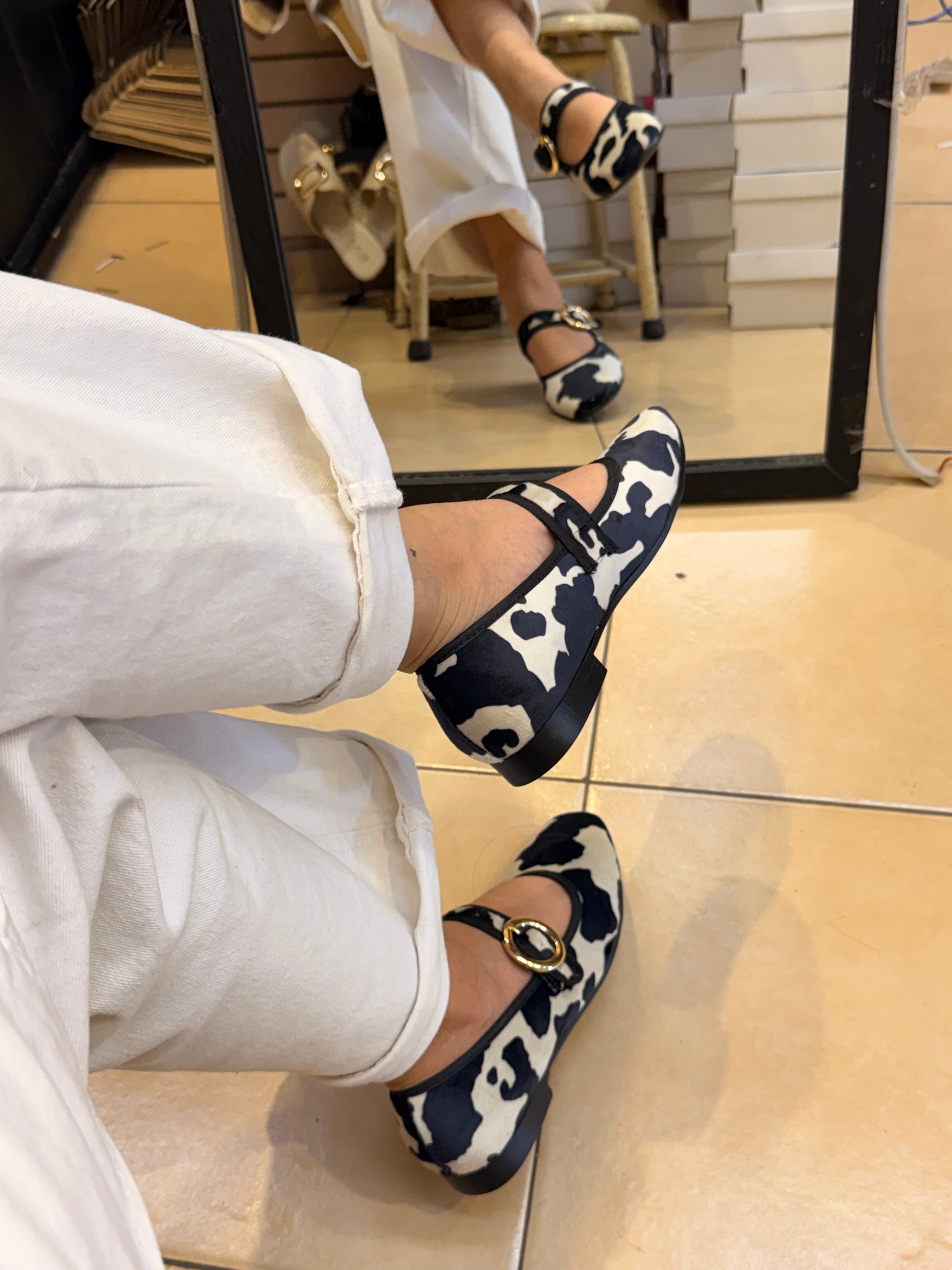 Chic black cow flat